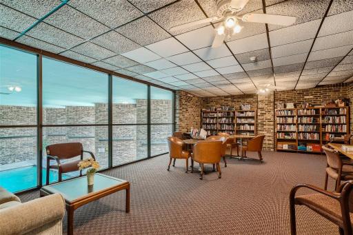 Wonderful quiet library/meeting room is yours to enjoy year round. Birdseye view of crystal clear pool