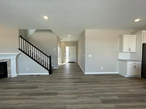 Great room views to the foyer. LVP flooring throughout the main level.