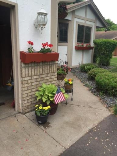 Flower boxes around the home provide a great opportunity to add a splash of color!