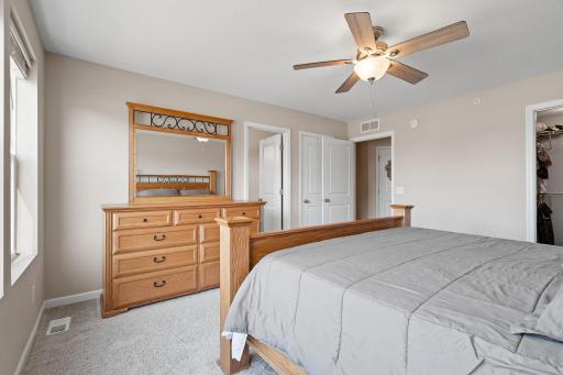 Private bathroom. Two closets in primary bedroom. Walk-in closet. A short distance across the hall is the washer and dryer, providing close access.