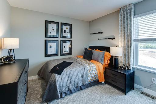 Each of the homes three additional bedrooms are also abundant in size! (Photo of model, colors are similar)
