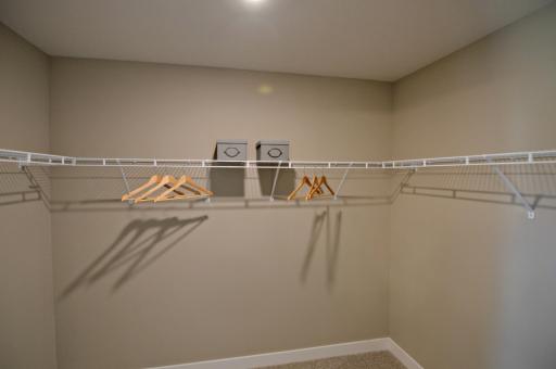 And then there is this: The walk-in closet you deserve!! (Photos of the same floorplan, colors may vary).
