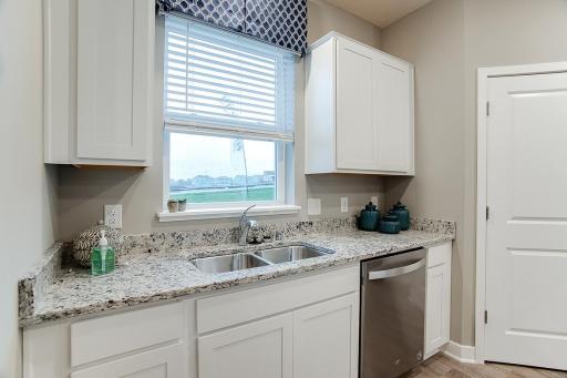 Here you can keep an eye on the kids out back as you are doing dishes. See sales agent for details on color selections.