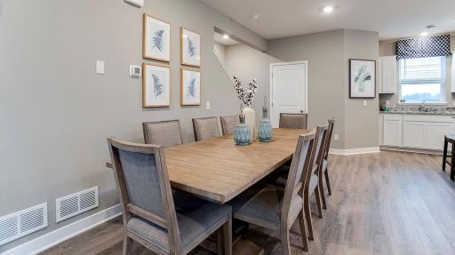 Great space for family dinners. Photos shown of same floorplan, see sales agent for details on color selections.