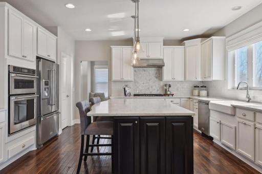 This home truly feels like new The choice of products are neutral and beautiful, perfect to match anyone's personal taste. Subway tile, designer tile behind the gas cooktop, large walk in pantry and tasteful farm style sink, a few you'll love.