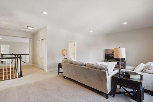 Generous upper level loft space, perfect for relaxing or gaming.
