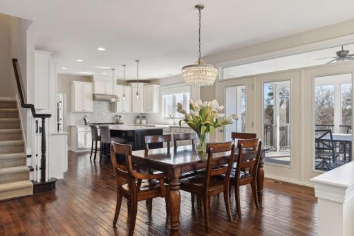 The dual stairways are convenient with the stunning front staircase and this featured stairway from the kitchen.