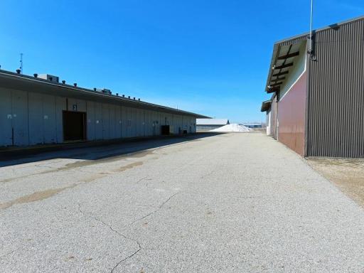 1301 3rd St W paved area between buildings.jpg