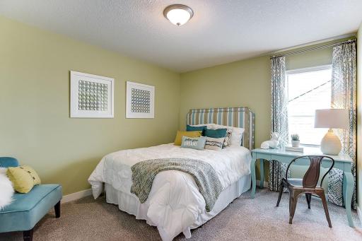 Secondary bedroom. *Photos of a similar home. Colors and options may vary.