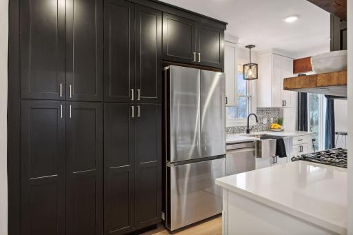 More than well appointed kitchen plus tons of storage with a full heigh pantry wall