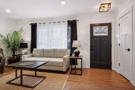 Stylish new front door greets you entering this fantastic home