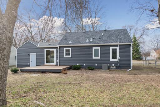 New architectural shingled roof and vents added in 2023