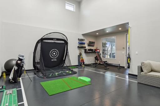 Adjacent to the sport court is an exercise area, perfect for your daily workout.