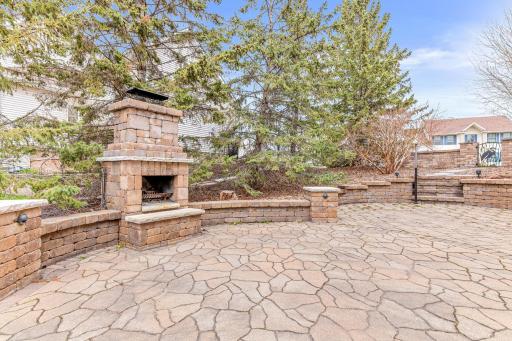 Beautiful paver patio with built in stone firepit