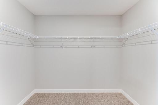 And then there is this walk-in closet, which is huge! Photo of model home, color & options will vary.
