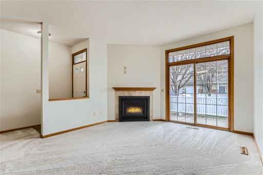 Gas fireplace and sliding glass door to your own spacious patio