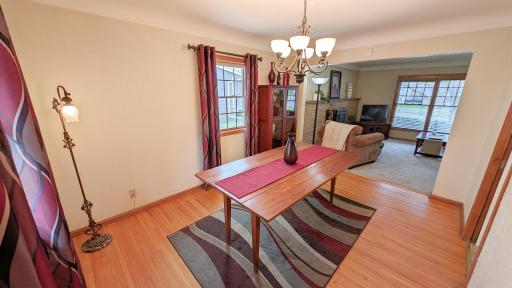 Wood floors extend into the living room and bedrooms too; currently they are covered with brand new carpet.