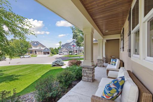 Imagine enjoying your morning coffee on this cozy front porch