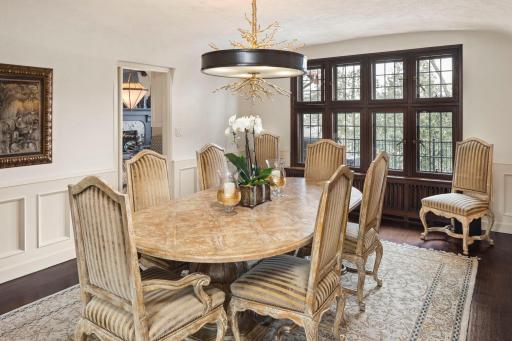 Host memorable dinners in the spacious dining room, where elegance and comfort converge. Abundant windows allow natural light to illuminate the room.