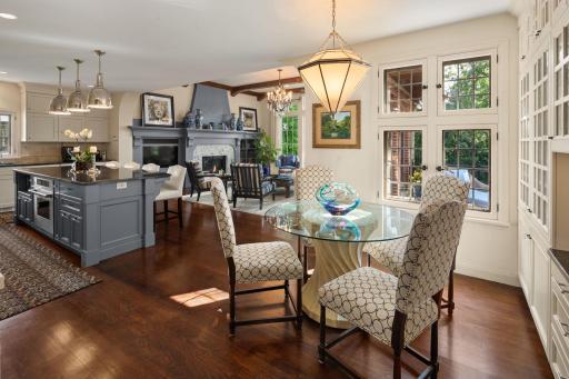 This open layout seamlessly flows between the family room, kitchen and informal dining area.