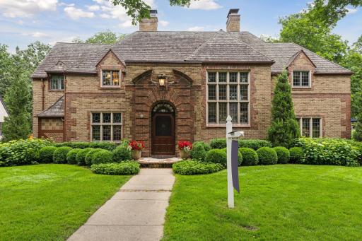 This two+ story home is located just 4 houses from Lake Harriet.