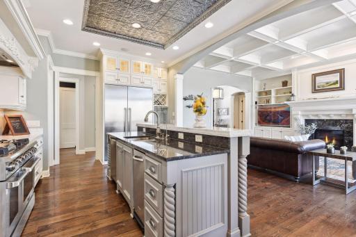 Center island with granite countertops and reverse osmosis system. Open to the beautiful great room.