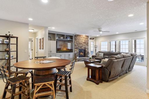 Fantastic lower level offering infloor heat throughout. Over-sized family room with stone gas fireplace, custom built-ins, and game area.