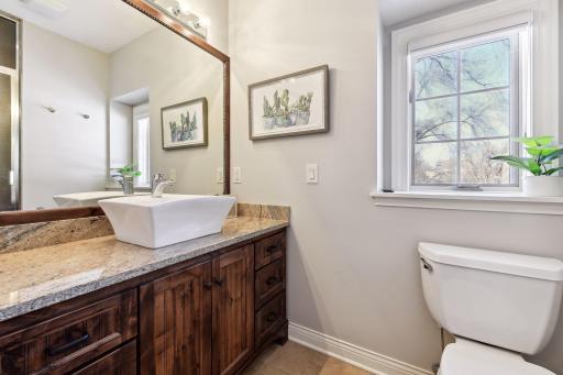 Windows in both bathrooms letting in natural light.