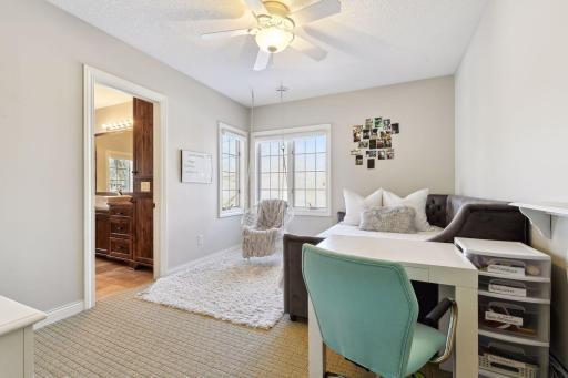 Nice-sized bedroom with walk-in closet, huge bathroom, & dual entry shower leading to the second bedroom.