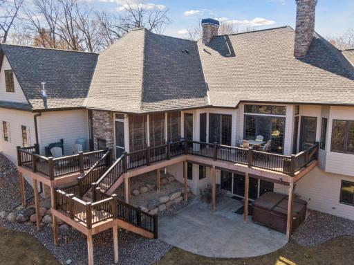 So much to offer with all the entertaining space in this backyard! Several seating area, maintenance free decking, and recently stained railing. Large, stamped concrete patio, and newer hot tub. What not to love!