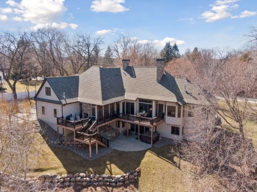 Whole house with Hardie board cement siding. Roof just replaced in 2023 with GAF Timberline HDZ shingles. In-ground sprinkler system, Invisible Fence, and beautiful boulder retaining walls.