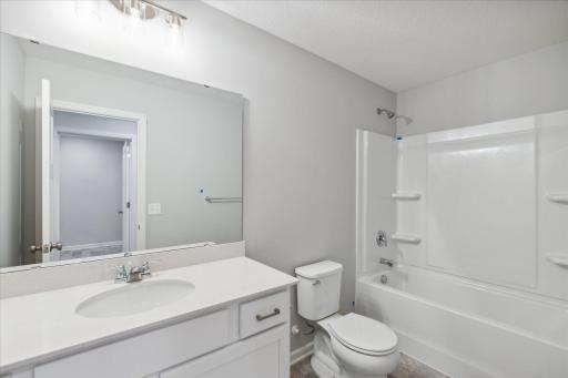 Shared hall Bathroom. Similar floorplan but different finishes.