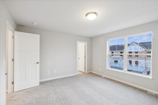 Owner bedroom. Similar floorplan but different finishes.