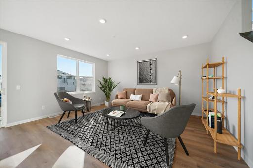 Photo for 6630 Wildflower Way, Minnetrista, MN 55331 - Listing #6505632 Living Room this plan has an electric fireplace