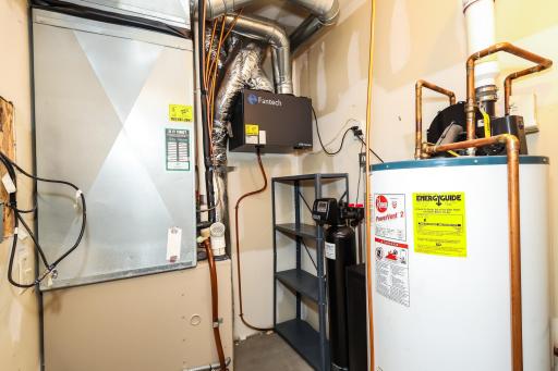 High efficiency furnace, power vent water heater and full size air exchanger!