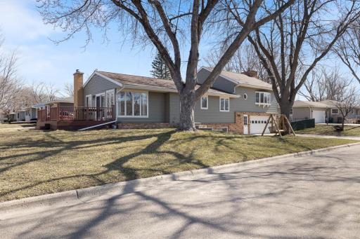 Located on a corner lot gives you some extra yard space on the side and front of this home