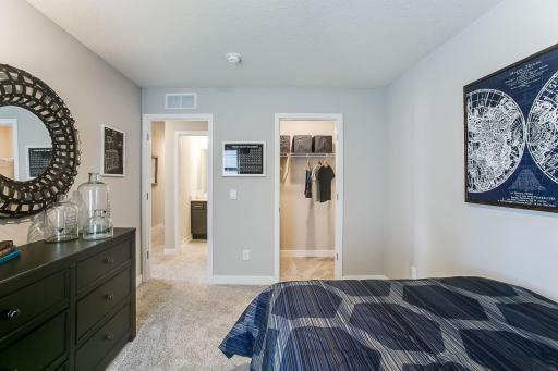 Another upper-level bedroom with abundant space! Photo of Model Home. Options and colors may vary. Ask Sales Agent for details.
