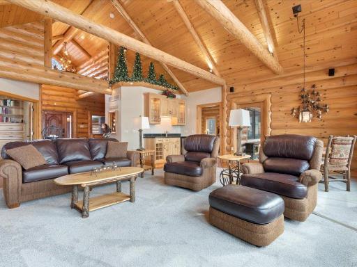 Main level great room with log beam accents