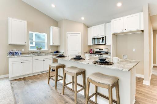 Imagine preparing a wonderful meal in this kitchen or entertaining friends and family over the weekend! Photos of model. Options & colors may vary.