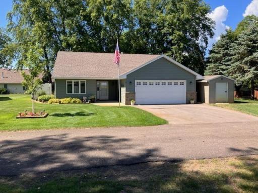 Photo for 2271 Highway 27 E, 8, Osakis, MN 56360 - Listing #6506633 Summer view with thriving mature trees behind the home.