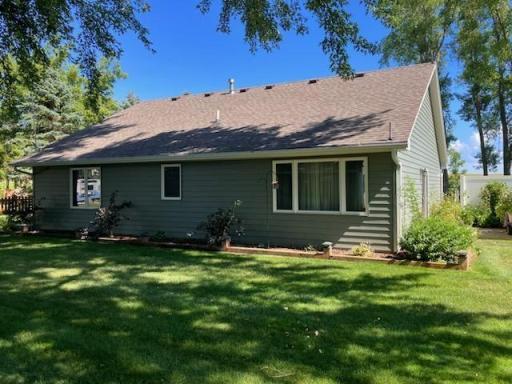 Photo for 2271 Highway 27 E, 8, Osakis, MN 56360 - Listing #6506633 Shaded backyard with lovely landscaping surrounds the home. Association takes care of lawn care and in-ground sprinklers.