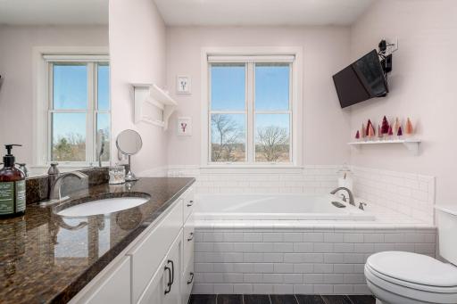 Soak all your worries away in this beautiful tub! The primary bathroom is huge with the separate soaking tub and walk in shower.