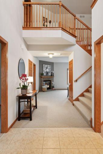 Two sided staircase from foyer leading upstairs