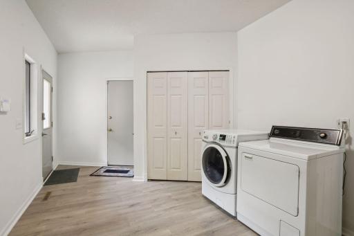 The drop zone, convient mud room with laundry and walk-in pantry off the kitchen