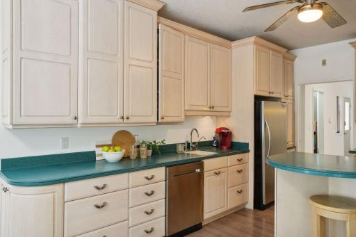 Stainless steel appliances, refrigerator with separate freezer sink with additional prep sink, warming drawer