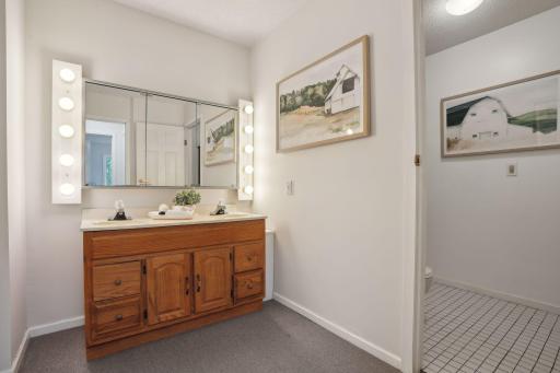 No morning arguments over the bathroom with this upper level full bath with two sperate vanity areas