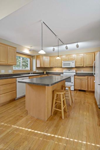 You will enjoy your kitchen featuring great counter space & lots of cabinet's!