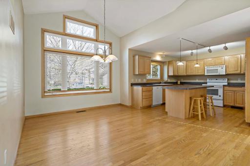 Vaulted dining room & newer windows throughout!