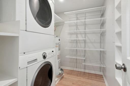 Not many condos come with IN-UNIT laundry. This one offers great storage, too.