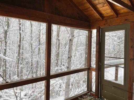 Plenty of room for all in this screened porch.jpg